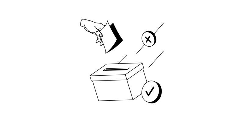 Eine Hand wirft einen Zettel in eine Wahlurne. Ein Kreuzchen und ein Häkchen.